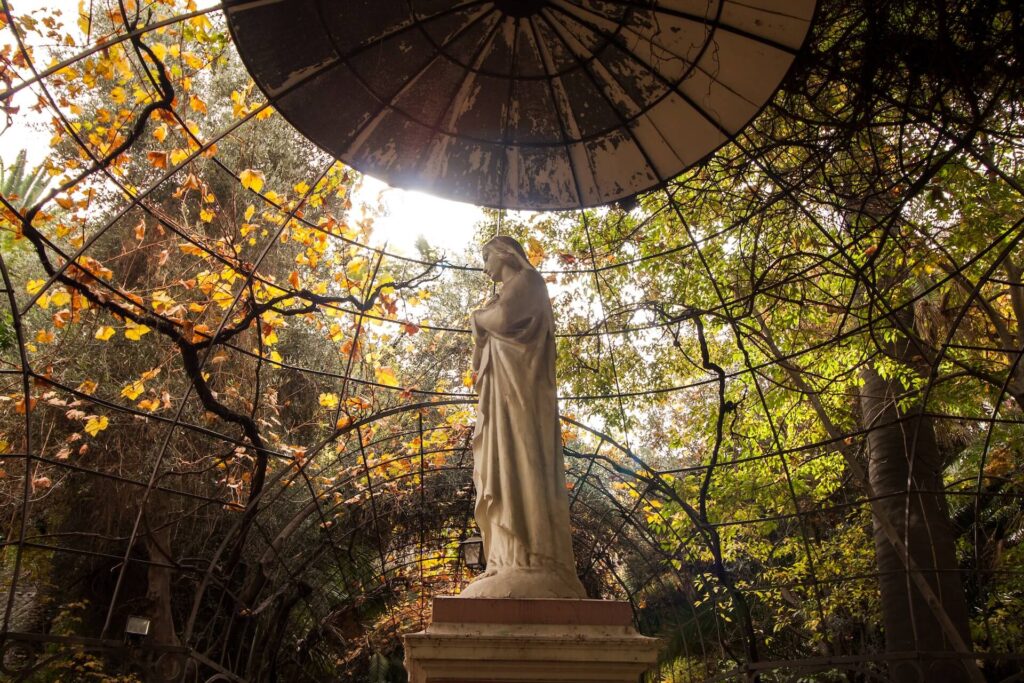 statue of an angel in a garden in santiago, chile