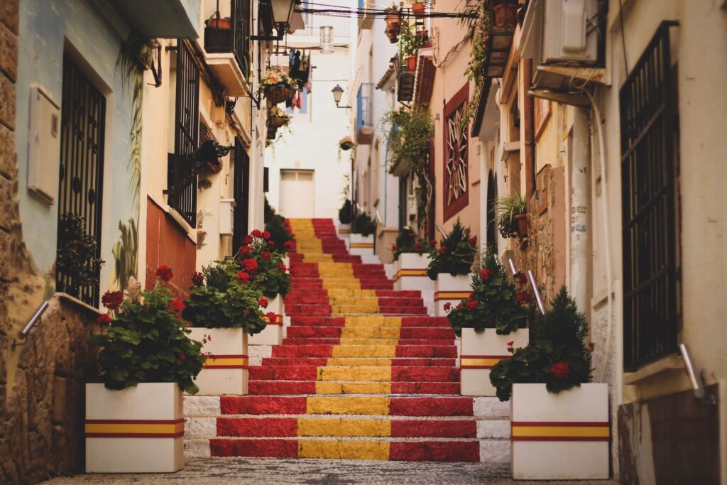 outdoor stairs painted with spanish flag colours